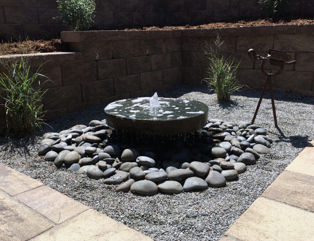 Backyard water feature by Thunderbird Design in Denver, CO
