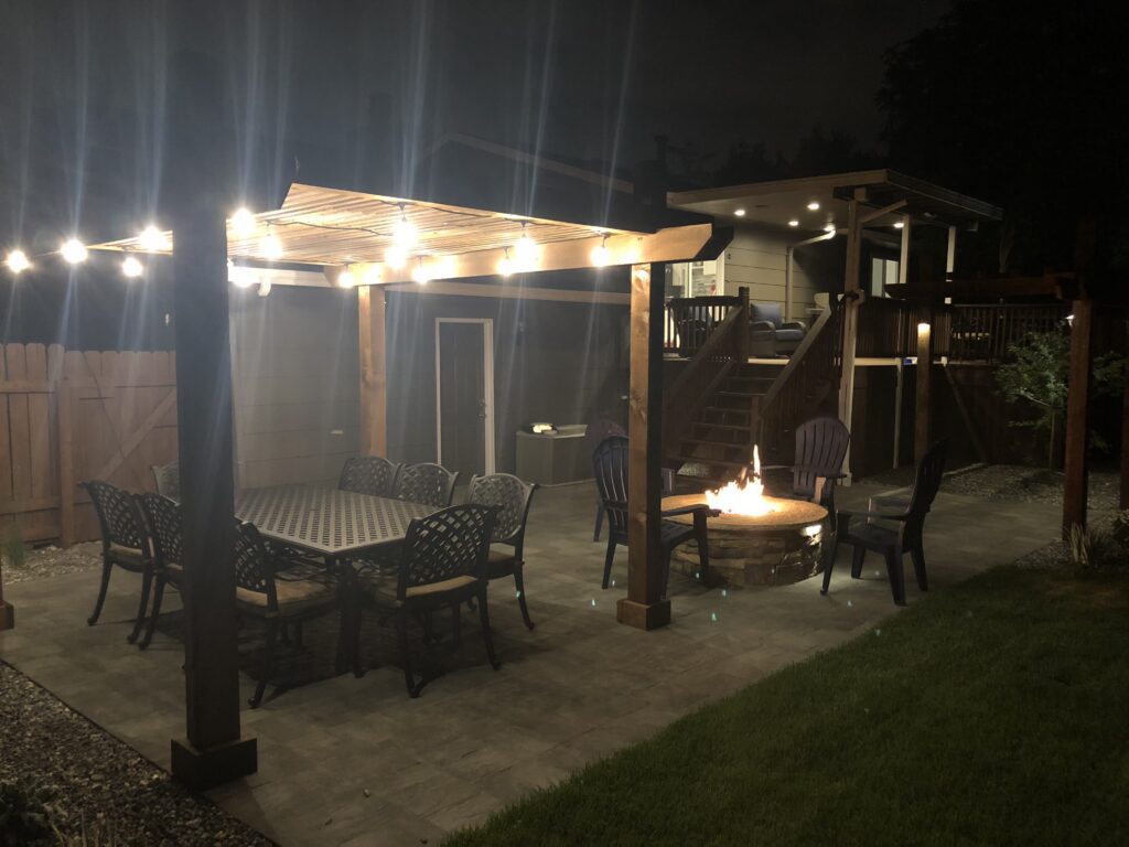 Landscape lighting at night by Thunderbird Design in Denver, CO